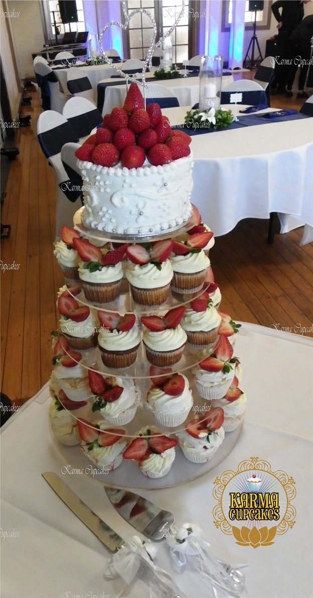 Baked cheesecake and pavlova wedding cupcake tower
