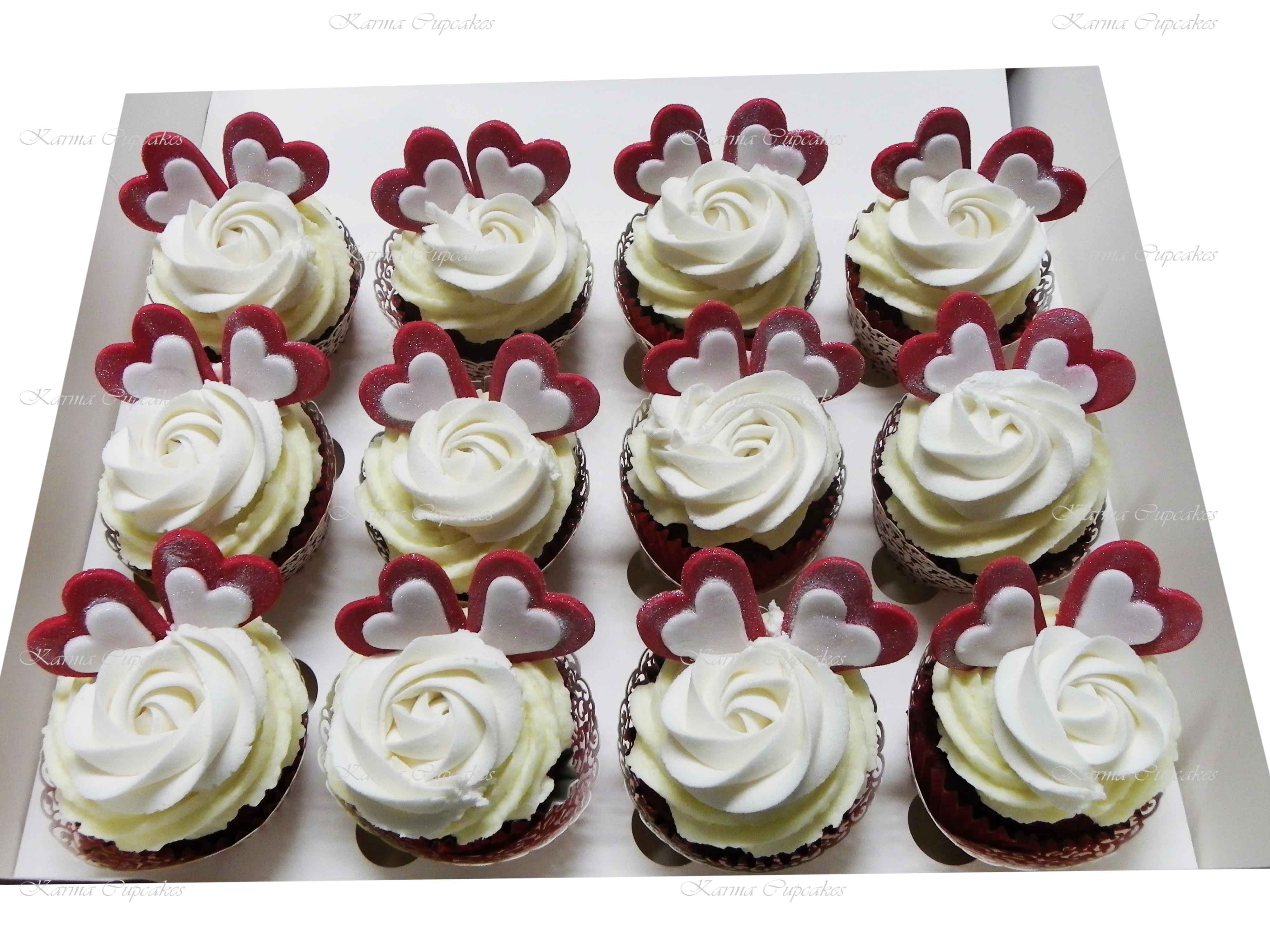Red velvet cupcakes with a Classic Rose Swirl Cupcakes with Red and White Hearts