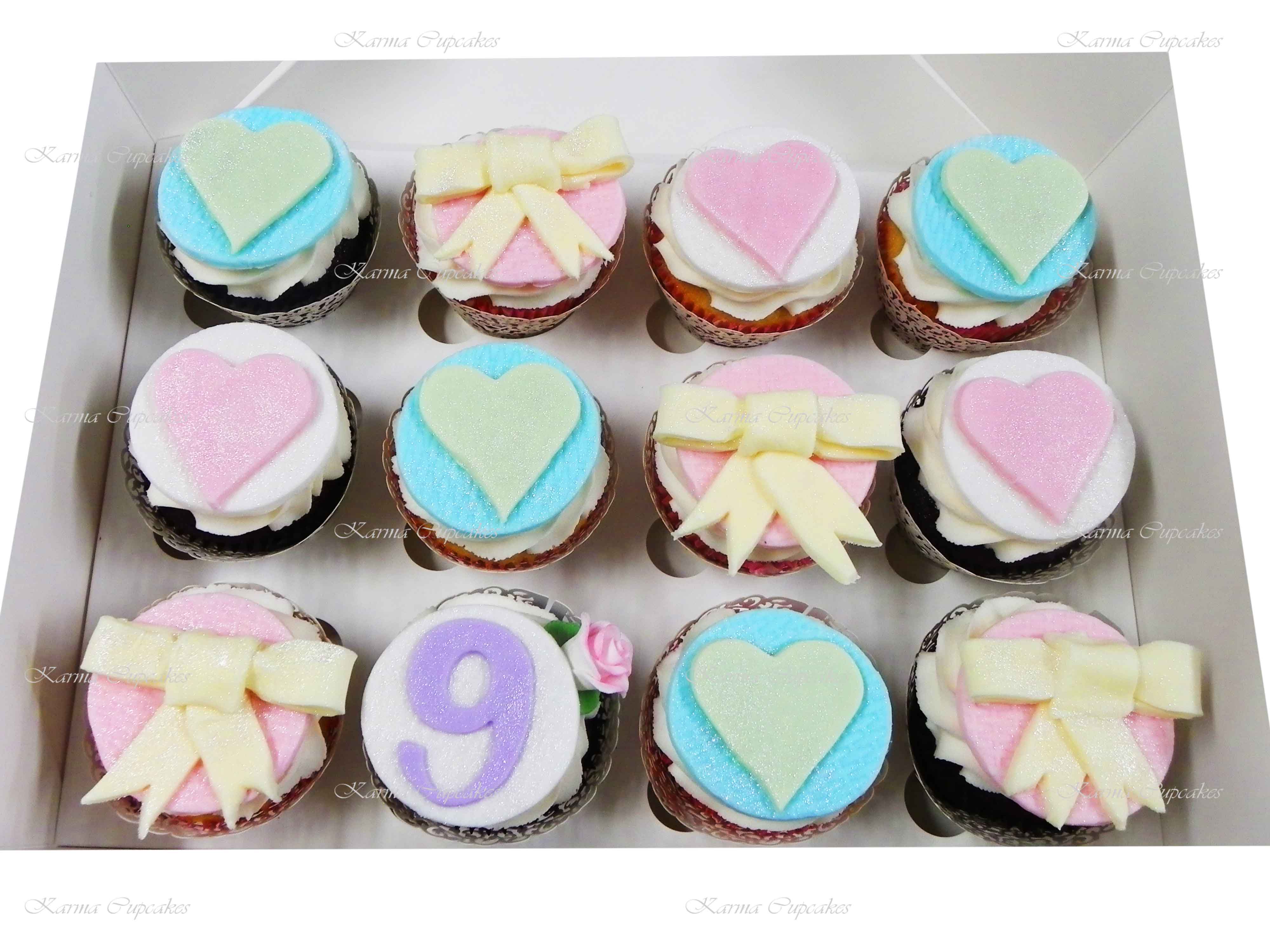 Number Birthday Cupcakes with Pastel Bows and Hearts