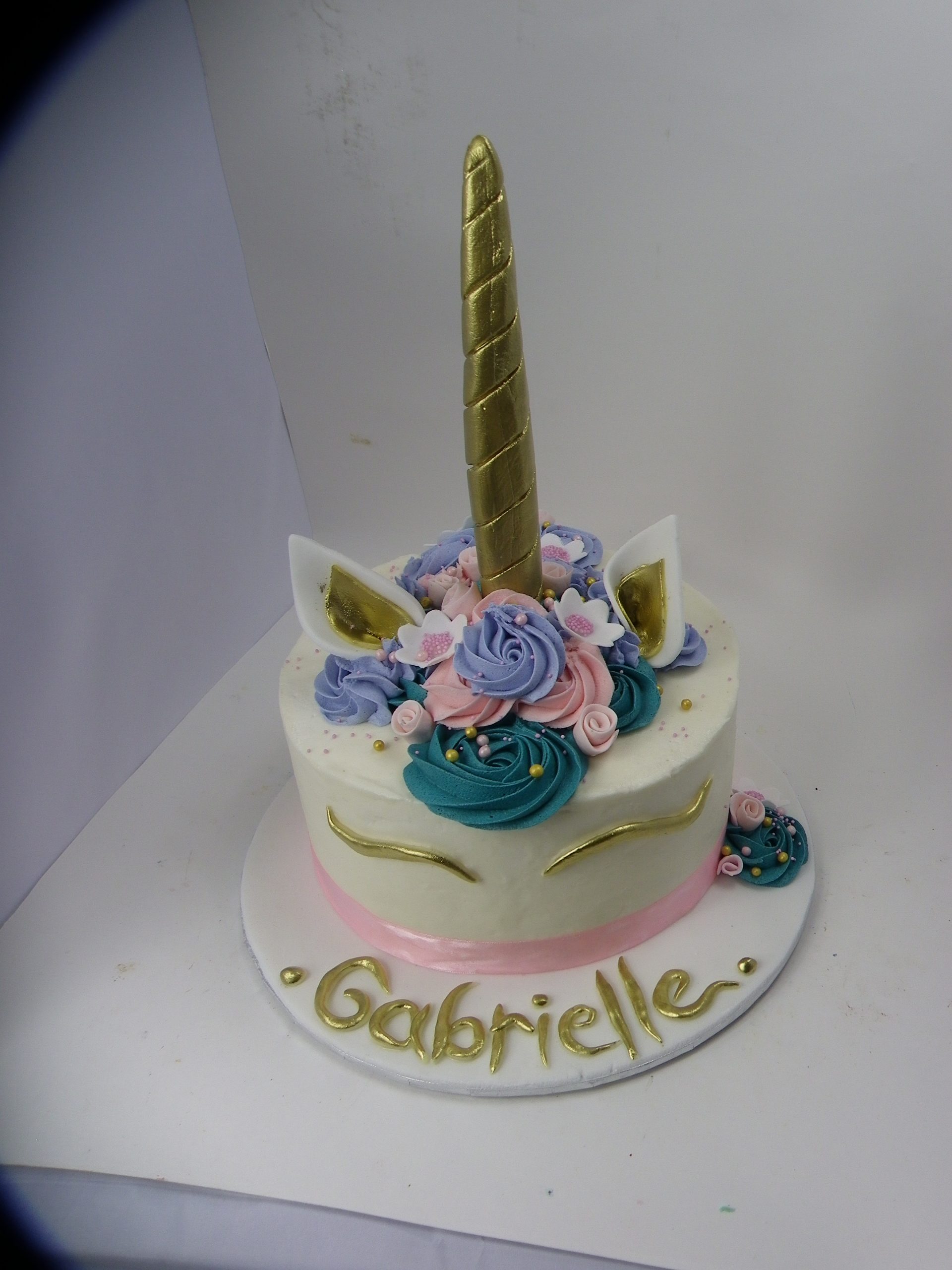 Gold and white personalised unicorn birthday cake