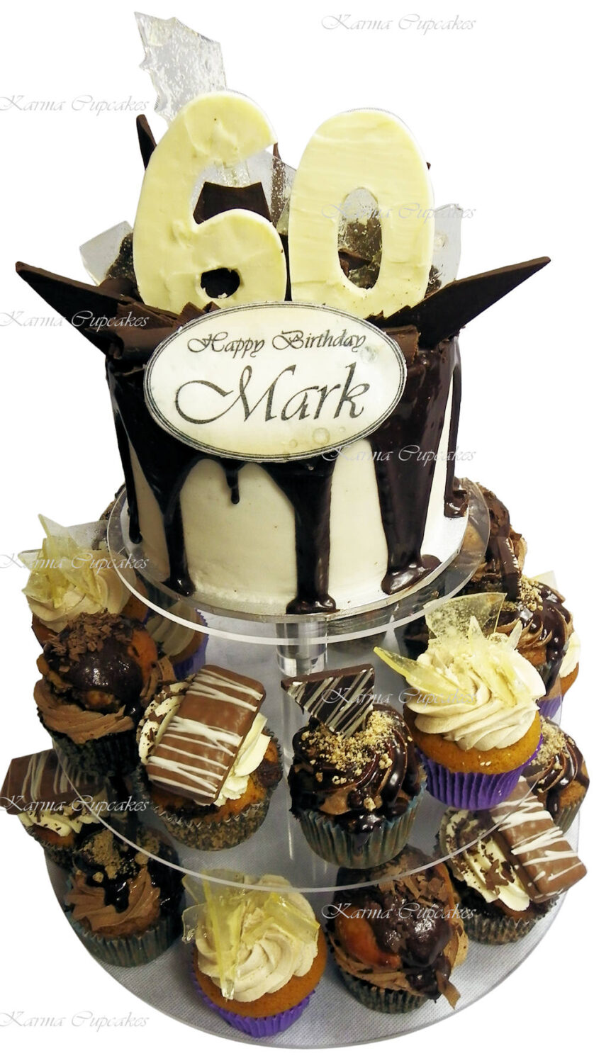 Male 60th chocolate birthday cake with cupcakes. copy