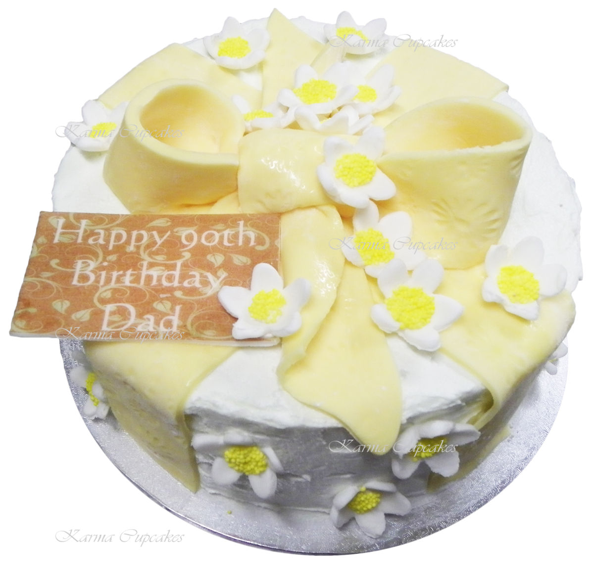 White and yellow buttercream birthday cake with bow copy