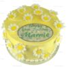Yellow-iced-cake-with-yellow-daisies