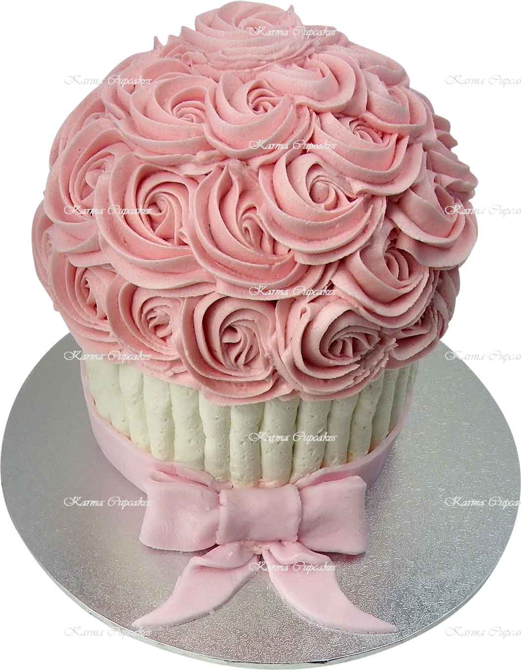 giant-pink-and-white-butter-cream-iced-cupcake