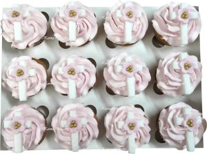 Pink baptism or christening cupcakes