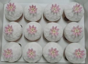 Embossed cupcakes with single handmade Pink Flower